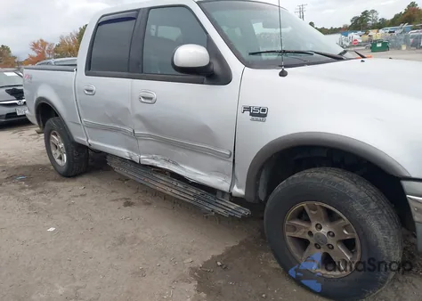 2002 Ford F-150 Lariat/Xlt z USA, uszkodzony, nr VIN 1FTRW08LX2KB72371